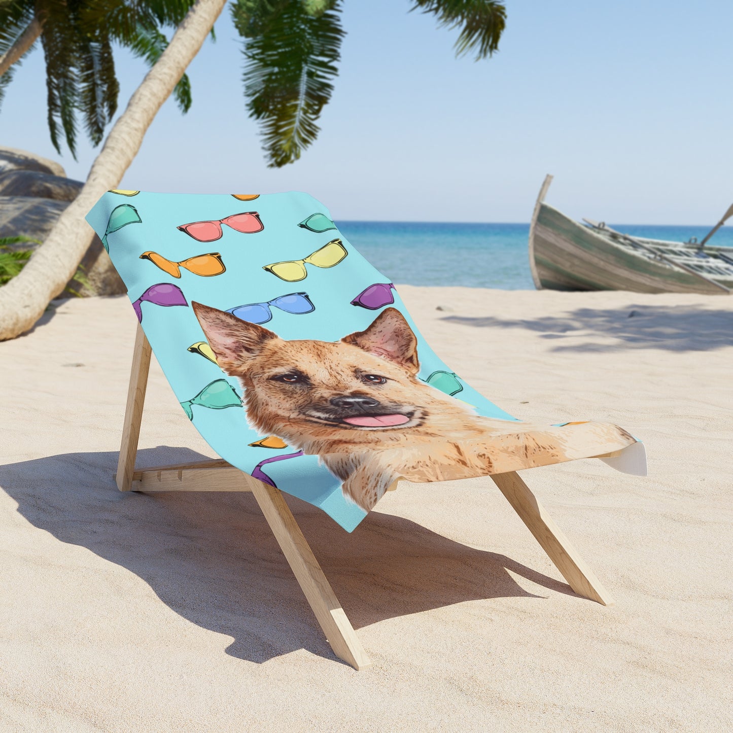 Dog on a beach chair with a colorful towel featuring sunglasses and a boat in the background