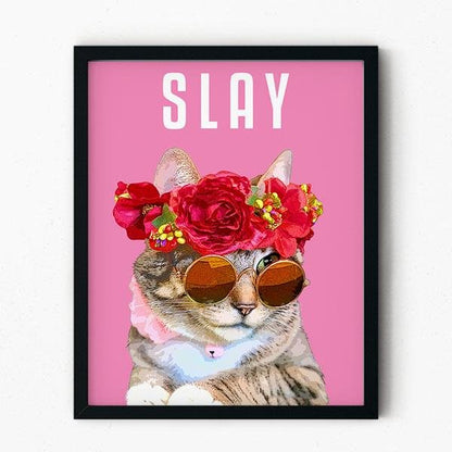 Framed artwork of a cat wearing sunglasses and a flower crown with 'SLAY' text on a pink background.
