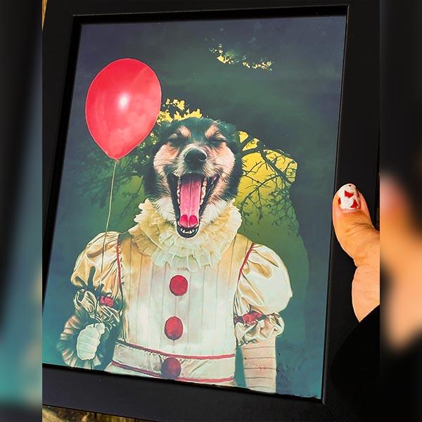 Framed artwork of a dog in clown attire with a red balloon