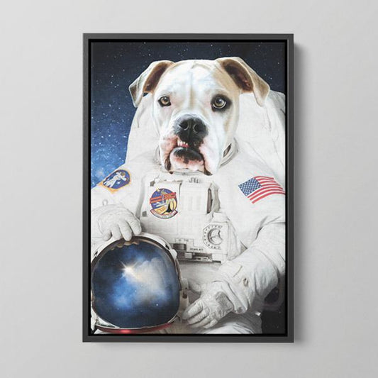 Custom astronaut pet portrait of a white dog in a spacesuit, displayed on a black framed canvas